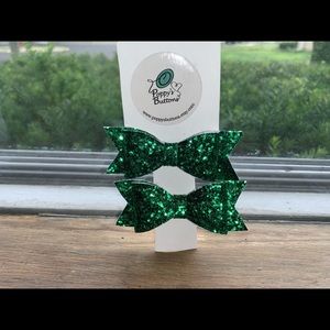 Pair of green hair bows